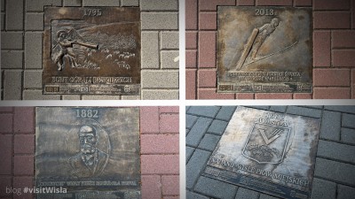 Kilka tablic z kart historii na głównym deptaku w Wiśle